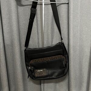 Calvin Klein Black Messenger Bag with Brown Accents